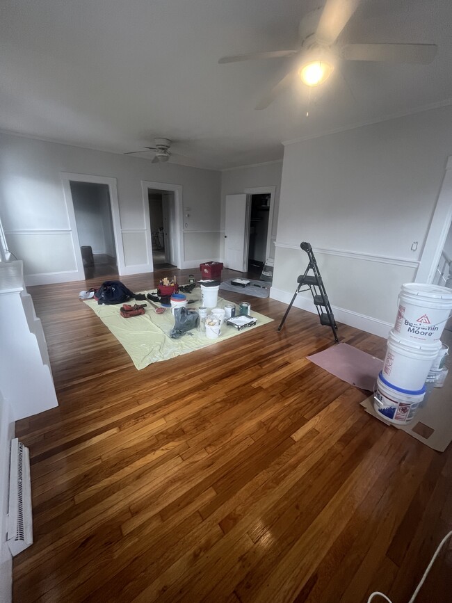 Newly sanded wood floors and being freshly painted - 1650 Commercial St