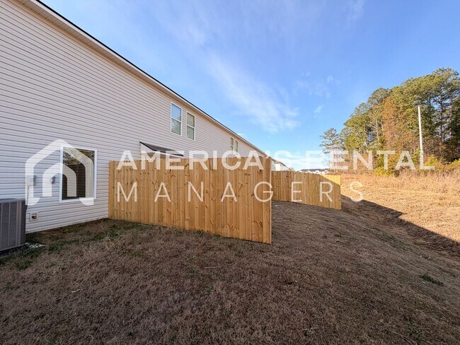 Building Photo - Spacious Two-Story Townhome with Open Layout!