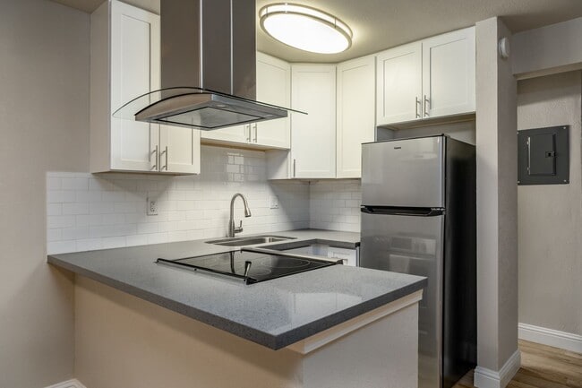Building Photo - Fully remodeled studio apartment in gated ...