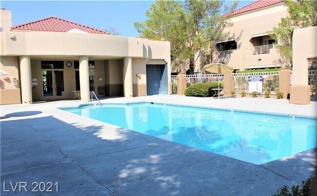Building Photo - Cozy 1-Bed Condo in Gated 89128 Community ...