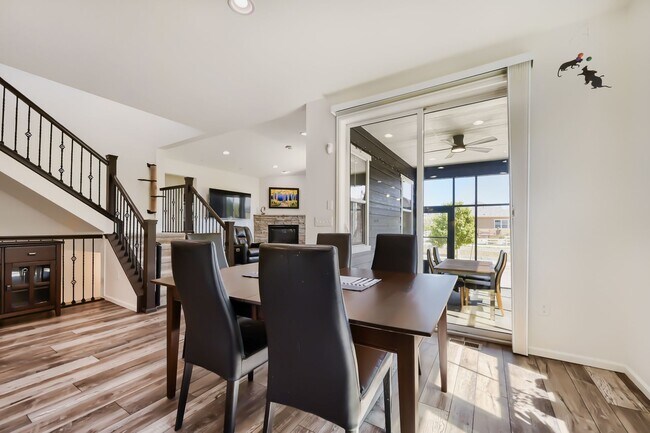 Building Photo - Stunning & Contemporary 4-Bedroom Home on Open Space-Available July 1st!