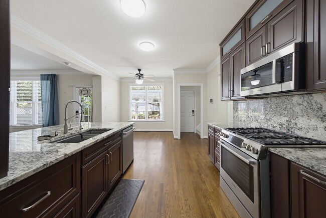 Building Photo - Southern Charm Meets Everyday Entertainment and Convenience!