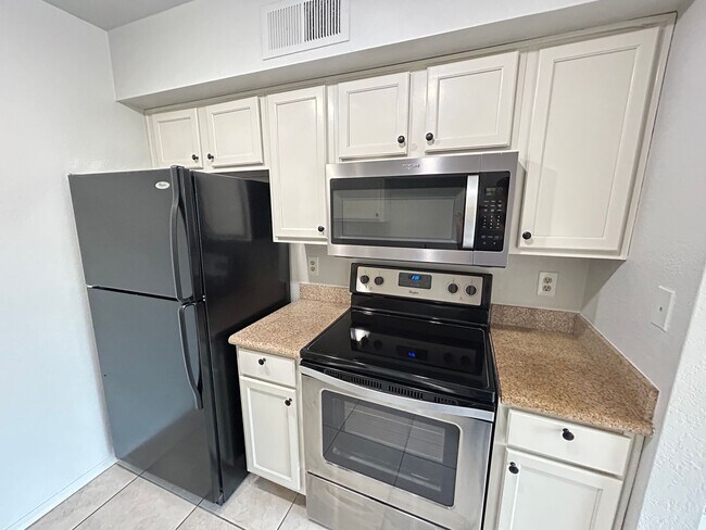 Building Photo - Welcome to Sunrise located in the Heart of...