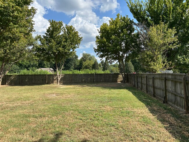 Building Photo - Spacious 3BR/2BA Lake Community Home | Soaring High Ceilings, Fireplace & 2-Car Garage