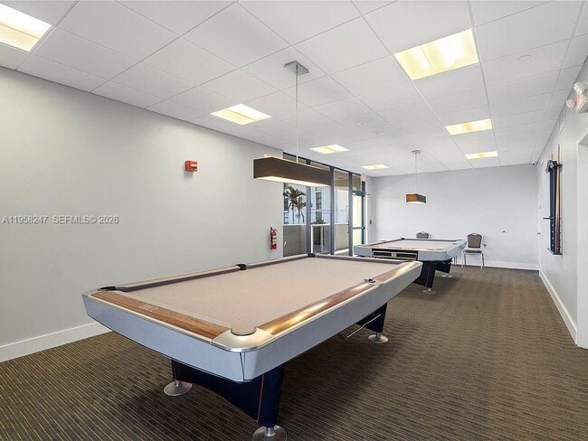 Building Photo - 3675 N Country Club Dr