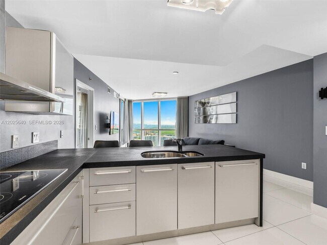 Building Photo - 18201 Collins Ave