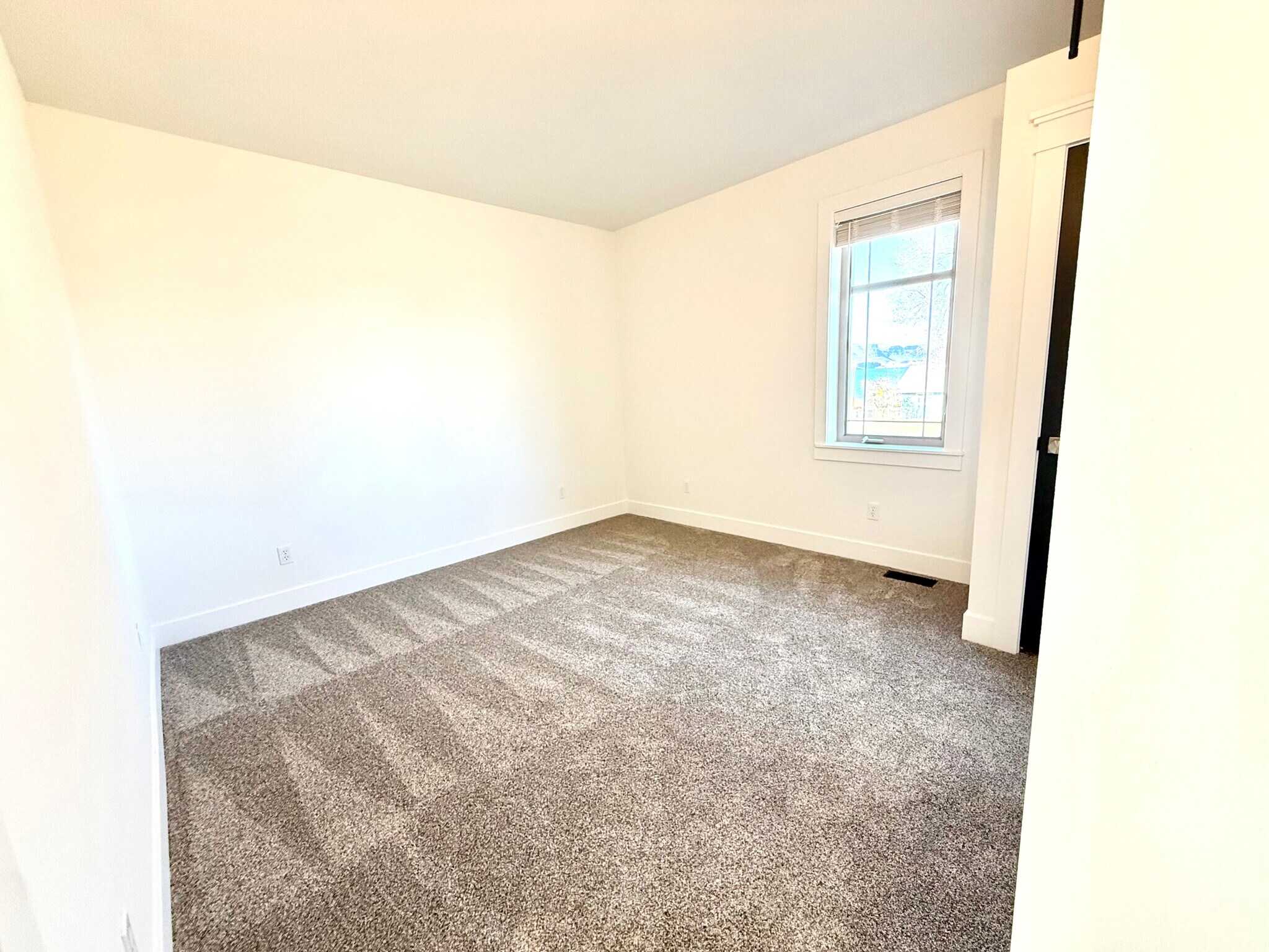 Master bedroom, lake view through window - 24 Ash St N