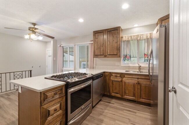 Building Photo - This charming, 4 bedroom 2 bath updated bungalow in the heart of Ogden for $2150 a month