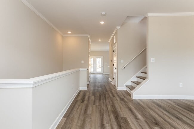 Building Photo - Spacious End Unit Luxury Townhome! Outstanding Location!