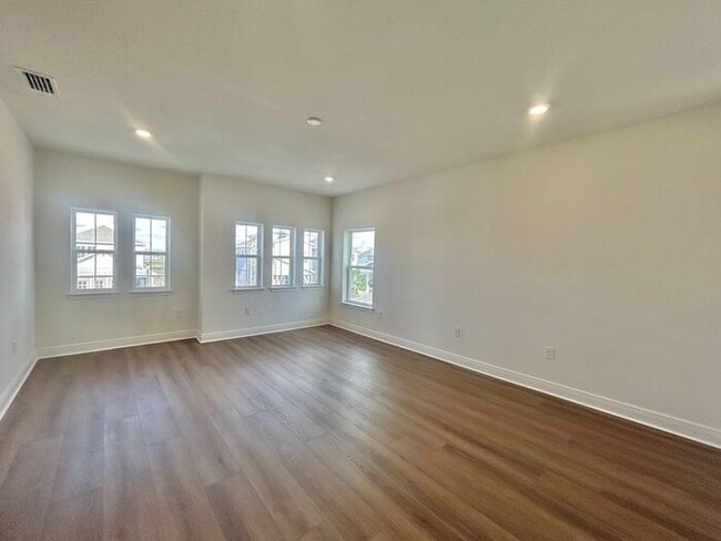 Building Photo - Gorgeous 4/3 Residence with a Private Back Lanai and a 3 Car Garage in the Delightful Laureate Pa...