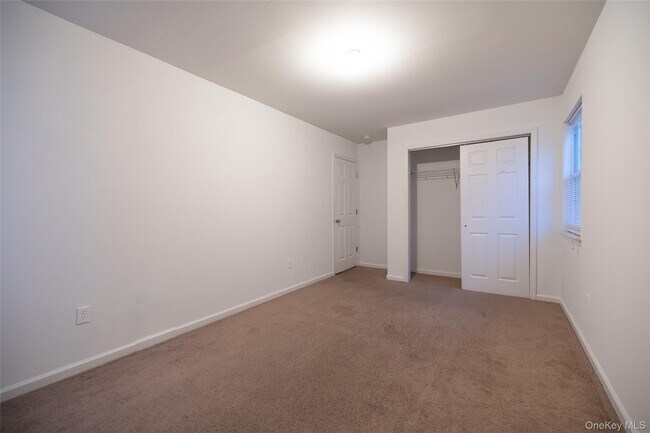 Building Photo - 62-21 Almeda Ave