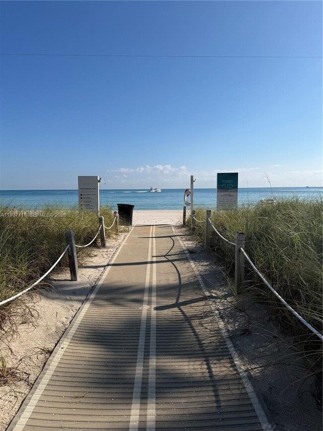 Building Photo - 10275 Collins Ave