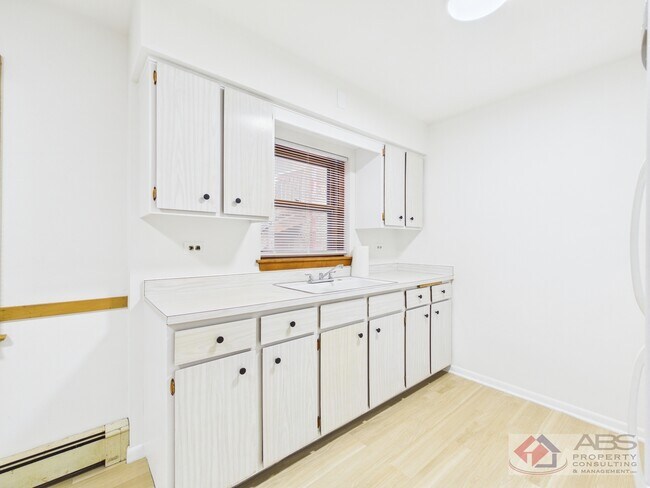 Building Photo - 11219 S Martin Luther King Dr