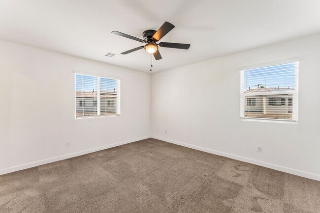 Building Photo - Modern Gated Townhome Living with Resort-Style Community Amenities