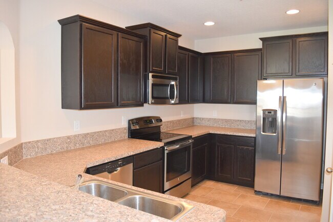 Building Photo - Beautiful Lake View Condo in a Prime Location