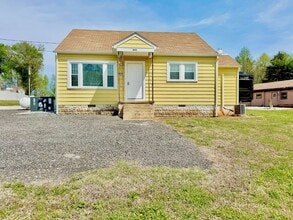 Building Photo - Fully Furnished and Utilities Included!