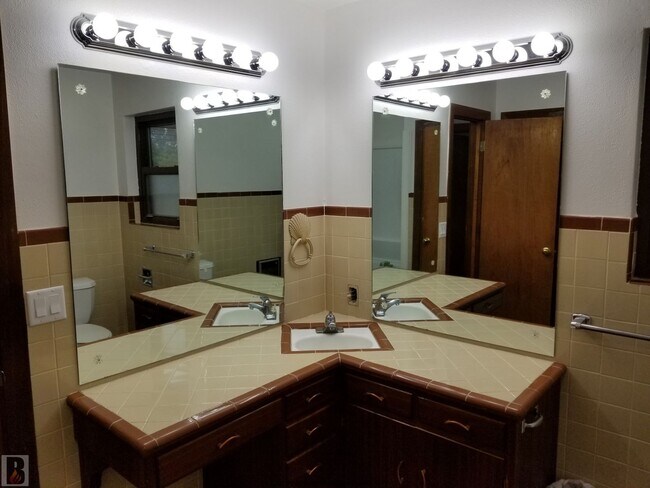 Building Photo - Massive Corner-Lot Home with Retro Charm & Shady Backyard!