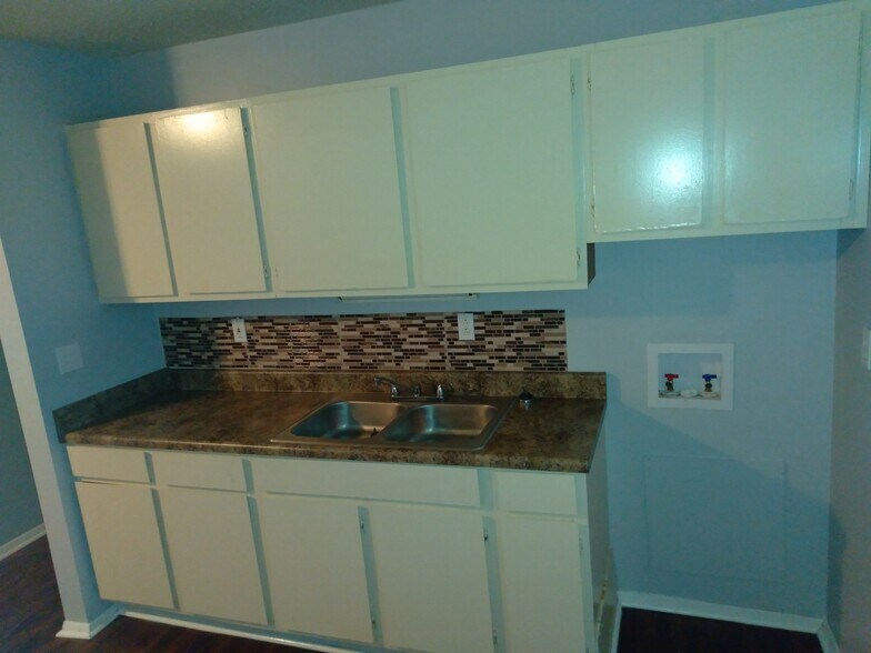 New countertops w/ tile backsplash - 3009 Avenue W