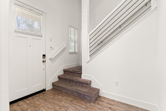 Building Photo - Sun-Filled Corner 4BR w/ Dual Yards & Panoramic Indoor-Outdoor Flow