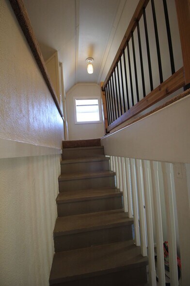 stairs going up to loft - 210 Northeast 5th Avenue