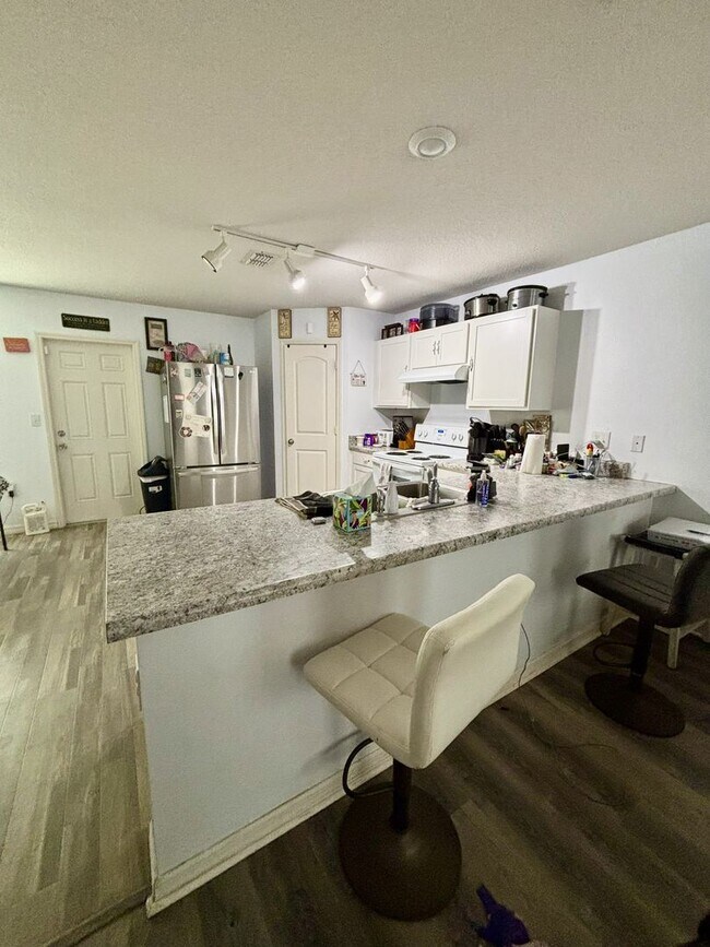 Building Photo - Four Bedroom / Three Bath Home