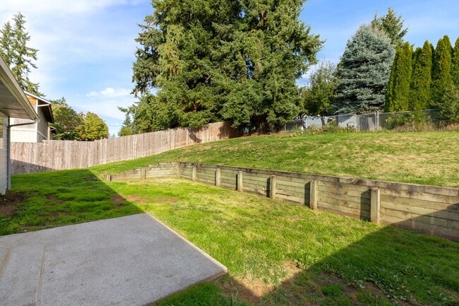 Building Photo - Recently updated 3 bdrm, 2 bath. Attached garage. Wrap around yard. Private upstairs bedroom and ...