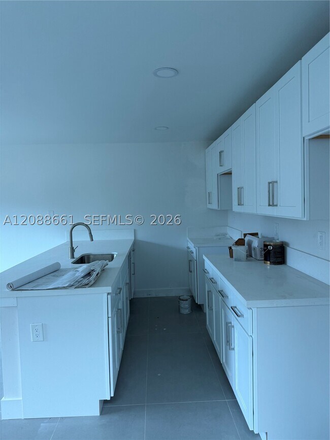 Building Photo - 6480 NE 1st Pl