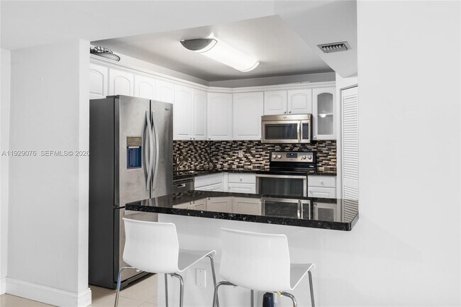 Building Photo - 9273 Collins Ave