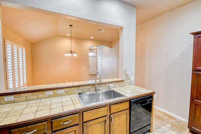 Building Photo - Beautiful three bedroom home with in-ground storm shelter!