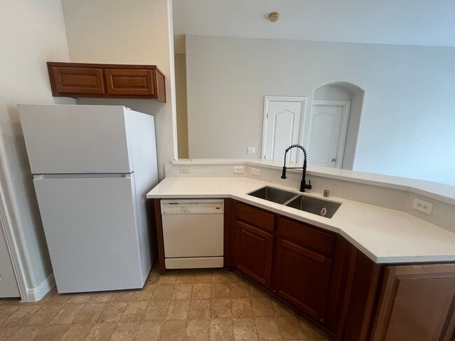 Building Photo - 2 story 2 bedroom - 2 bath - 1 car attached garage - 1182 sq feet -  in gated community.