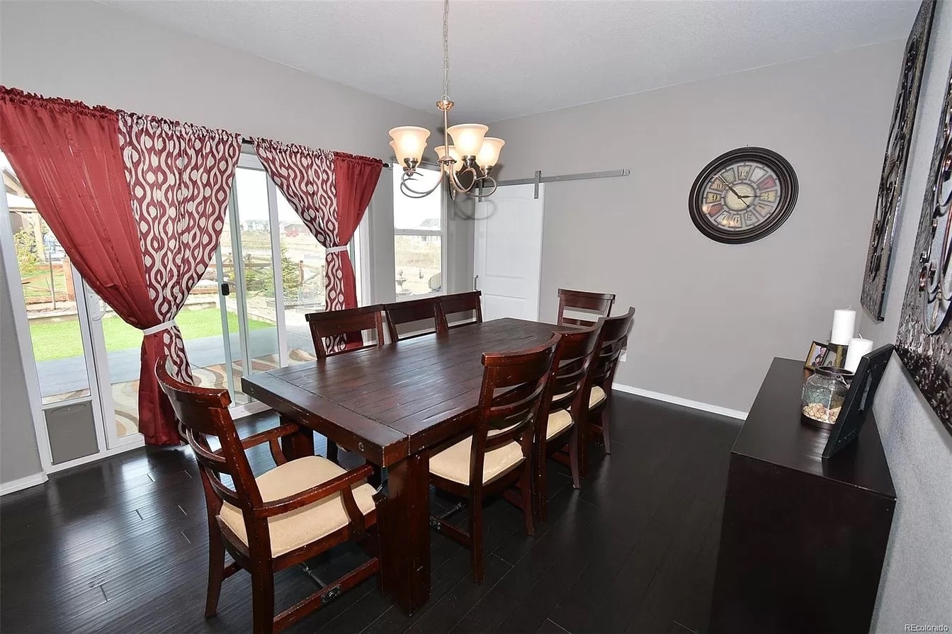 Access to backyard via dining room - 8782 Windy Plains Ct
