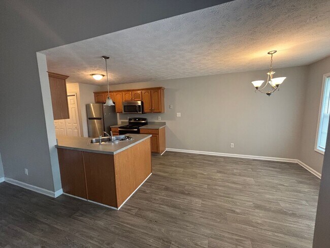 Building Photo - Location, Community, Quality Living. It Starts Here!