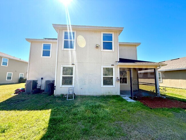 Building Photo - Room to Live, Space to Thrive! Stunning 6BR Home with Solar, Upgrades & Screened Lanai in Macclen...