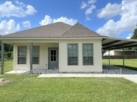 Building Photo - 7677 River Ridge Dr