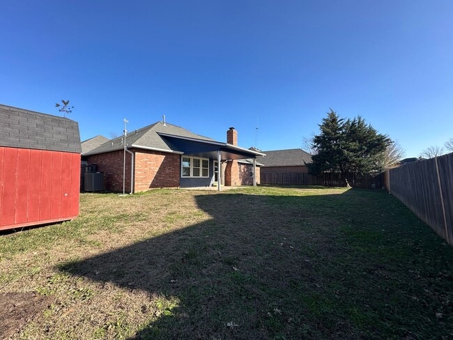 Building Photo - Clean, updated home on a corner lot with privacy fence and storage shed.