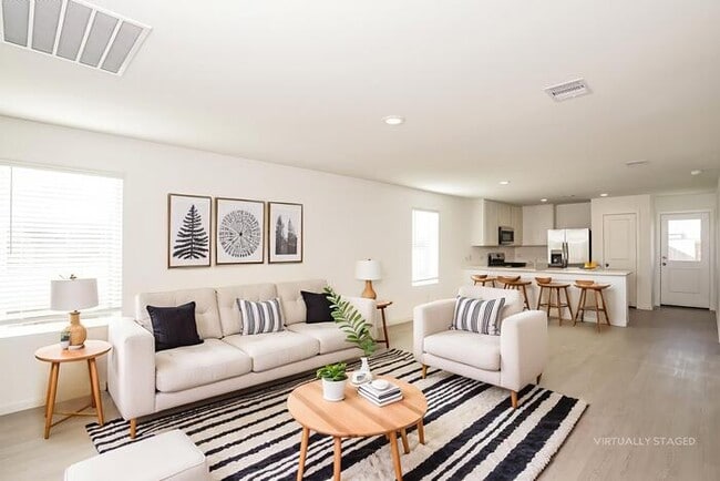 Building Photo - Live the Sunterra Lifestyle: Lagoon, Pool & More