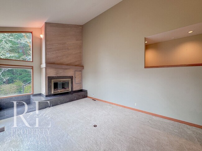Building Photo - Vaulted 2-Bed Home with Scenic Views, Gas Fireplace & Oversized Deck
