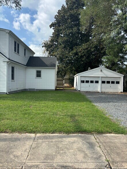 backyard with garage and drive - 10 14th St