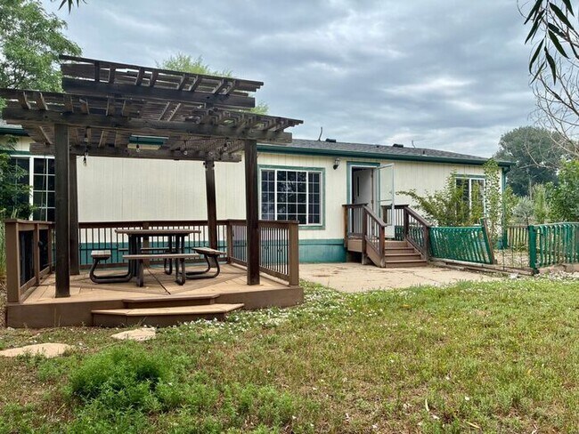 Building Photo - Country Property With Over 7 Acres of Land, No HOA & Room For Your Toys!