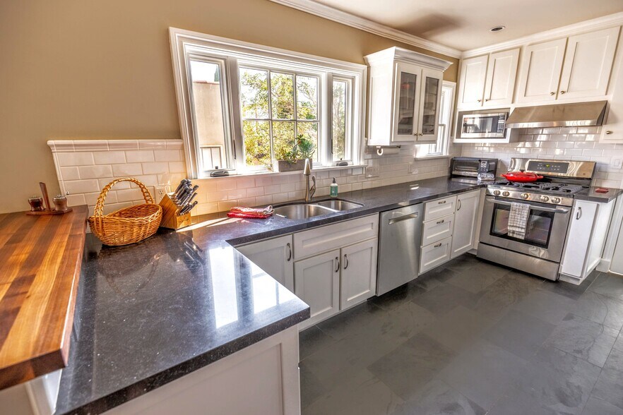 Custom cabinets and tile. - 1327 S Sycamore Ave