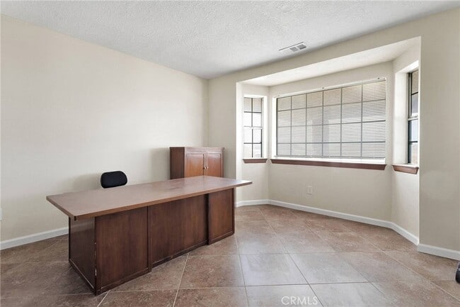 Building Photo - 25733 Roundup Way