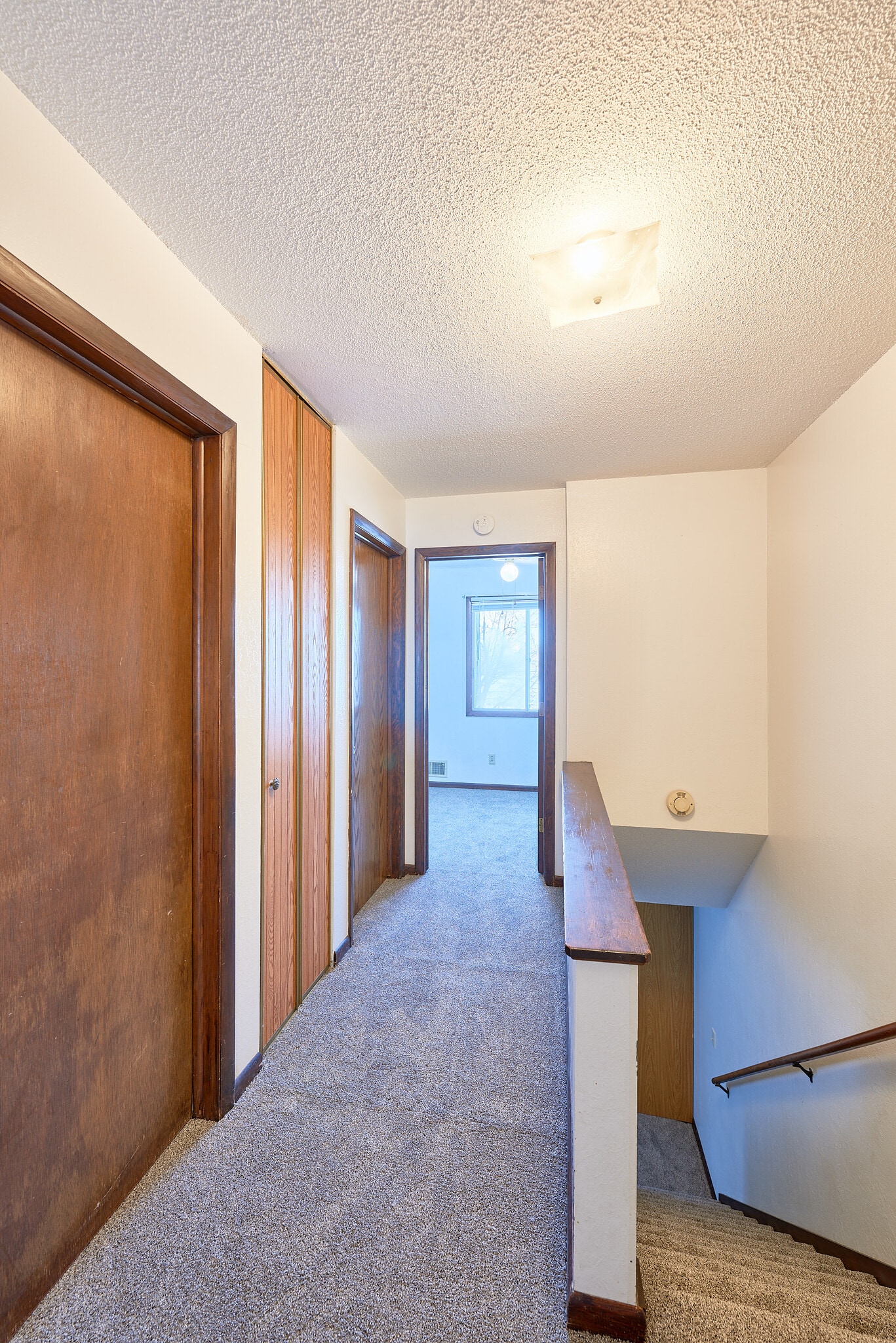 Upstairs hallway after replacing carpet - 1350 16th Ave S
