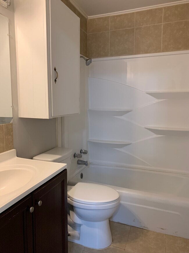 Building Photo - WoodCreek Apartments
