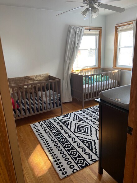 Bedroom with good natural light and ceiling fan - 221 17th Ave N