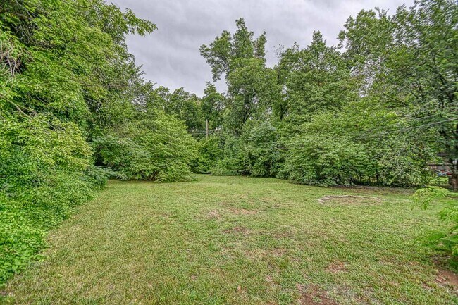 Building Photo - Newly Remodeled Campus Property! Lawn Care Included!