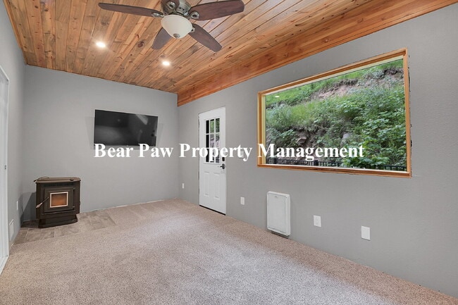 Building Photo - Spacious 4-Bedroom Retreat in Scenic Conif...