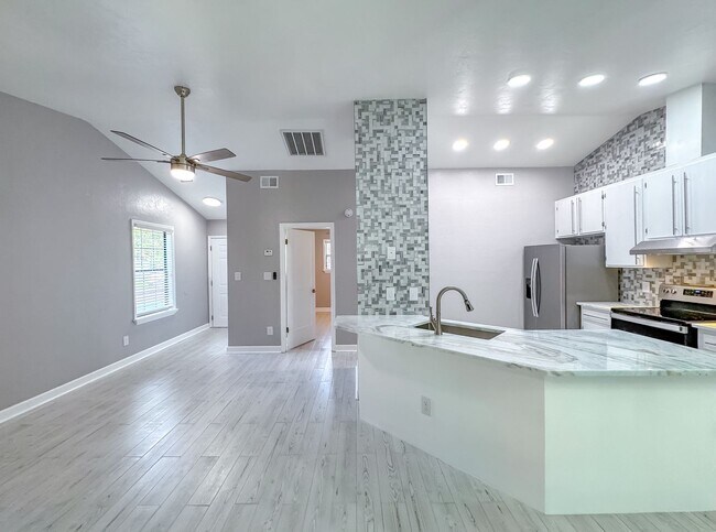 Building Photo - MODERN & Redone 1/1 w/ Tile Floors Throughout, Stainless Appliances, Granite Counters, Washer/Dry...