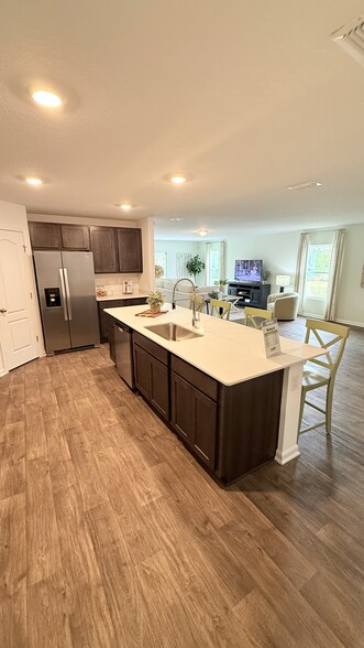 Picture of model home. The home has white cabinets - 16 Summerwood Rd S