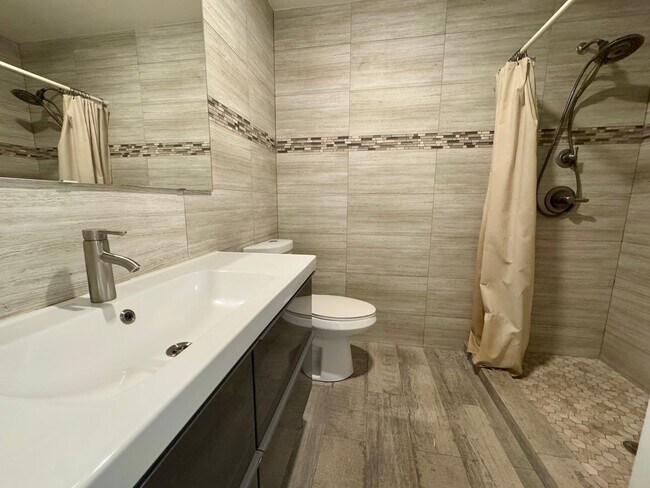 Building Photo - Large Open Layout Nestled in a Quiet Neighborhood with Stunning Mountain Views