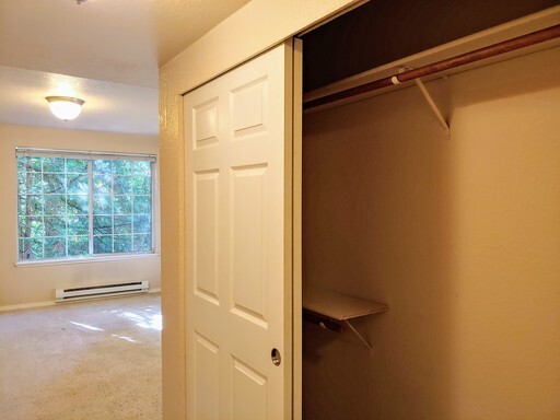 Building Photo - Lovely Condo in the Woods - Deck - Carport - FP - Closets - WD/DW - Fitness Center - Pools